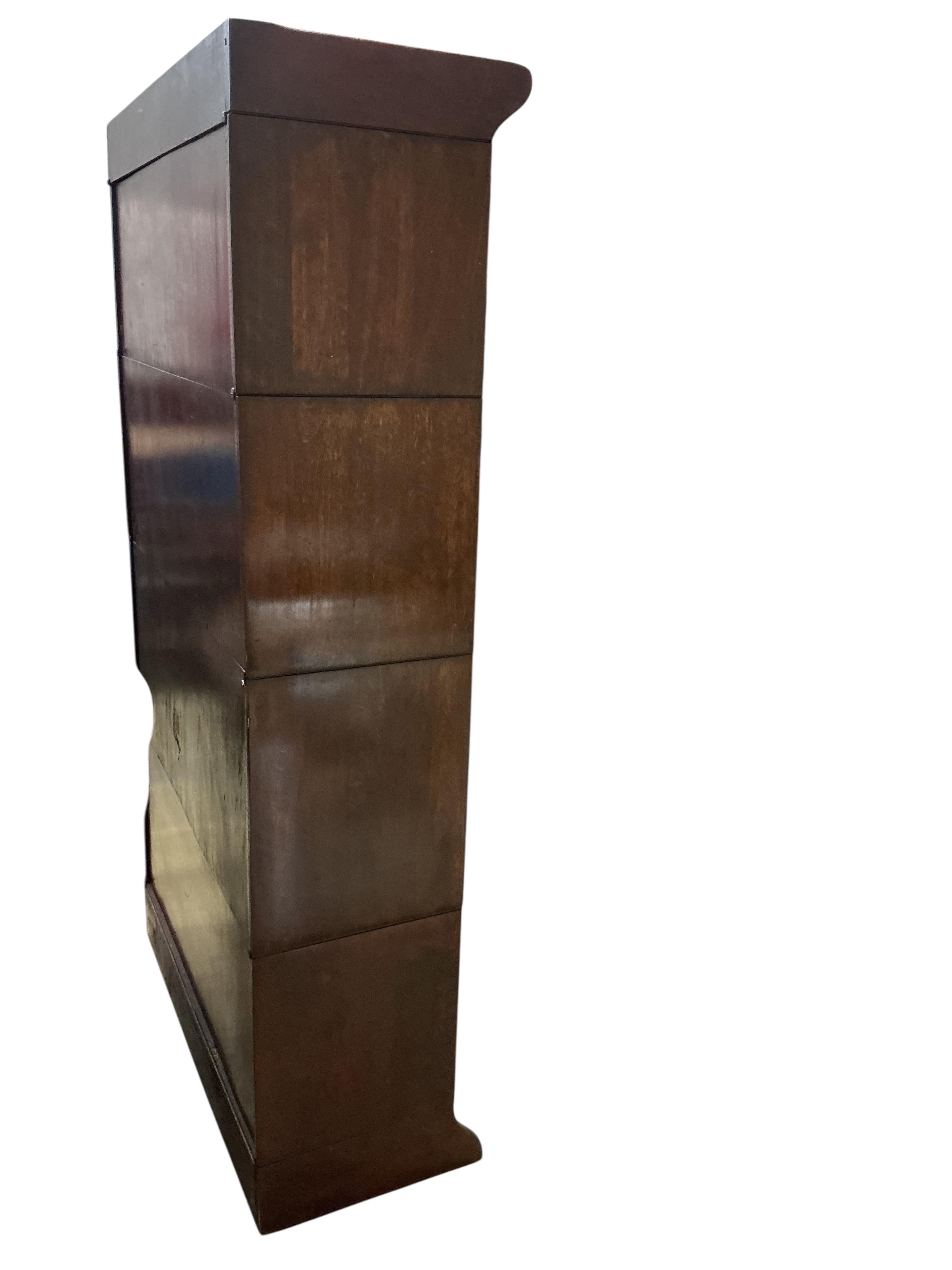 A Globe Wernicke style mahogany four section bookcase, width 87cm, depth 35cm, height 157cm